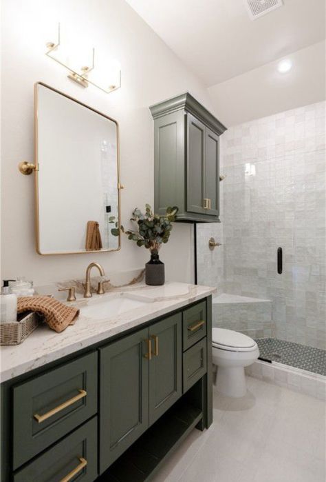 Bathroom Vanity Olive Green, Bathroom Remodel Olive Green, Neutral Green Bathroom Ideas, Moody Green Bathroom Cabinets, Small Moody Master Bath, California Casual Interior Design Bathroom, Diy Ensuite Makeover, Sage And Gold Bathroom Ideas, Sage Green Restroom