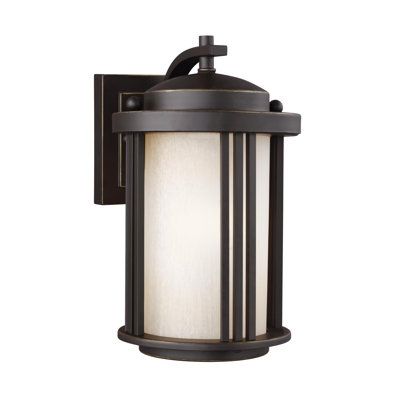 The one light outdoor wall fixture in black creates a warm and inviting welcome presentation for your home's exterior. The transitional Dunkley outdoor lighting collection by Darby Home Co conveys art decor influences with its linear, vertical details and clean, overall design. Their large scale gives these light fixtures real presence without competing with the residential architecture they adorn. The advanced, incandescent option has warm-on-dim technology that warms in color when dimmed, goin Wall Lanterns, Sea Gull Lighting, Generation Lighting, Sea Gull, Outdoor Wall Lantern, Wall Lantern, Small Wall, Outdoor Wall Lights, Wall Light Fixtures