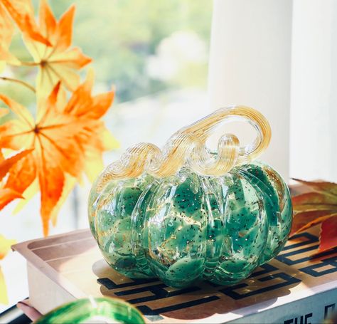 This glass pumpkin adds a whimsical touch to your Fall decor. Autumn Aura, Art Glass Pumpkin, Pumpkin Table Decorations, Harvest Thanksgiving, Glass Pumpkins, Halloween Fall, Autumn Decor, Fall Harvest, Room Type