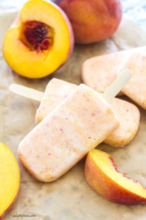 These easy peach popsicles are made with Greek yogurt and honey, making them a healthy way to stay cool in the heat! | www.alattefood.com Greek Yogurt And Honey, Yogurt Popsicle Recipes, Honey Making, Peach Popsicles, Breakfast Popsicles, Frozen Yogurt Popsicles, Stay Cool In The Heat, Healthy Popsicle Recipes, Healthy Popsicles