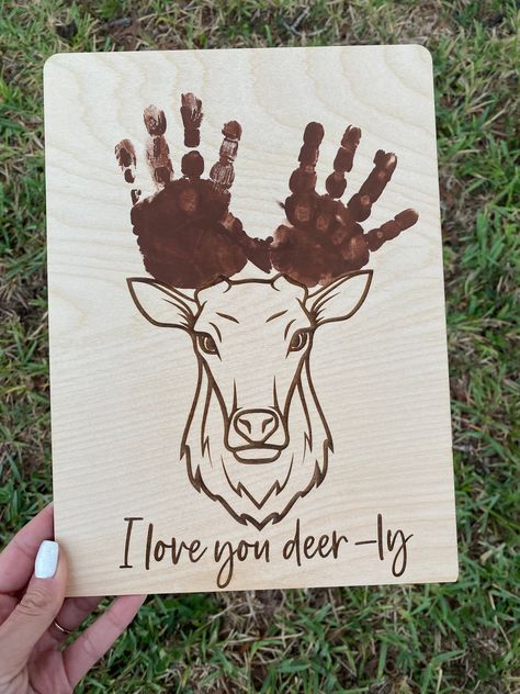 "I love you Deer-ly Handprint sign  8.5\" x 12\" sign made from 1/8\" Baltic Birch wood 3D and engraved DIY handprint sign  Sign contains: *Engraved phrase and deer  *sign will NOT come with any handprints on it this is a (DIY) project *sign does NOT come with paint" Father’s Day Gift From Grandchild, Gifts For Dad Diy From Daughter, Father’s Day Wood Art, Crafts For Dad From Kids, Fathers Day Gifts From Toddlers, Fathers Day Gifts Ideas From Kids Diy, Father’s Day Gifts From Kids, Diy Fathers Day Gifts From Kids, Father’s Day Crafts For Kids