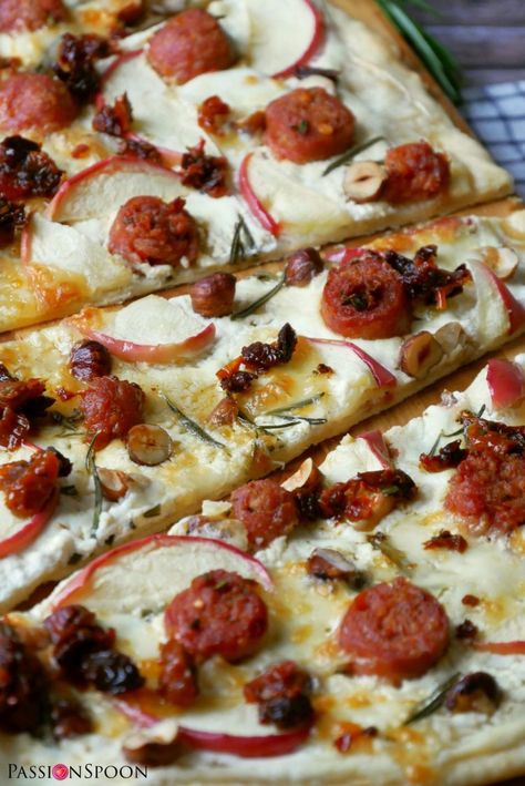 Apple rosemary sausage Flammkuchen is a combination of sweet, savoury, crunchy and creamy. Italian salsiccia, aromatic rosemary and sun-dried tomatoes, apple, hazelnuts and mozzarella on a crispy and golden crust make a gorgeous lunch, dinner or snack. Germany meets Italy in a quick delicious meal. #flammkuchen #pizza #germanfood #salsiccia #passionspoon #mozzarella Quick Delicious Meals, Buffalo Mozzarella, Rosemary Sprigs, Sun Dried Tomatoes, German Food, Dried Tomatoes, Apple Slices, Green Salad, Sun Dried