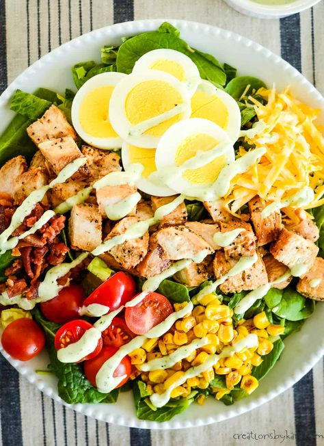 Love Chick-fil-A's Chicken Cobb Salad? Learn how to make your own version at home with this simple copycat recipe. It's the perfect way to satisfy your cravings! #chickencobbsalad #copycatrecipe #cobbsalad @Creations by Kara Restaurant Meals At Home, Chik Fil A Cobb Salad, Chicken Salad Chick Pasta Salad Recipe, Chickfila Copycat Recipes, Cobb Salad Chick Fil A, Chick Fil A Cobb Salad Recipe, Factor Meal Recipes Copycat, Chick Fil A Cobb Salad, Chick Fil A Copycat