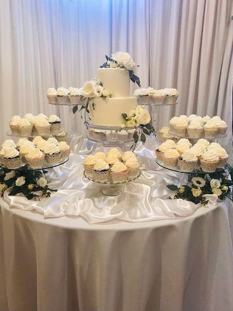 Small Wedding Desert Table, Wedding Cake With Cupcakes Around It, Cupcake Display For Wedding, Two Tier Wedding Cake And Cupcakes, Cake Table Wedding With Cupcakes, 2 Tier Cake With Cupcakes, Wedding Cake Table With Cupcakes, Multiple Cakes Wedding Display, Multiple Wedding Cakes Display