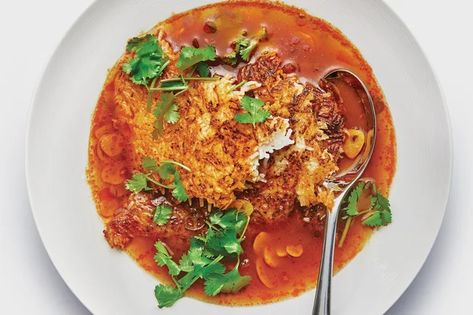 Spicy and Tangy Broth With Crispy Rice recipe | Epicurious.com Mint Leaves Recipe, Rice Crispies Recipe, Indian Soup, Crispy Rice, Veggie Stock, Broth Recipes, Crushed Red Pepper Flakes, Rice Crispy, Rice Dishes