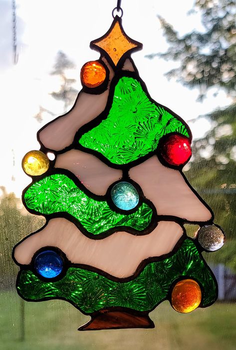 ALL PHOTOS ARE OF SAME PIECE - SAME PIECE YOU WILL RECEIVE Christmas Tree Stained Glass Suncatcher 17 piece Stained Glass Suncatcher Handmade with premium art glass - including Dichroic & Iridescent glass  approximately 4.5" x 6" Custom Request Welcome Christmas Tree Stained Glass Patterns, Stained Glass Patterns Christmas, Stained Glass Ornaments Christmas, Christmas Stained Glass Ideas, Stained Glass Christmas Patterns, Christmas Stained Glass Patterns, Stained Glass Winter, Christmas Suncatchers, Stained Glass Cabinets