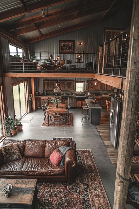 High angle view of a lofted barndominium interior farmhouse style with modern and industrial elements. Take a look inside these barndominium interiors and get inspired with rugged charm to create a cozy, stylish living space. Barndominium Cathedral Ceiling, Living Room And Kitchen Floor Plan, Barndominium With Small Living Space, Living Room Ideas Barndominium, Designing A Barndominium, Guest House Barndominium, Farm Style Apartment, Witchy Barndominium, Barndominium With Atrium