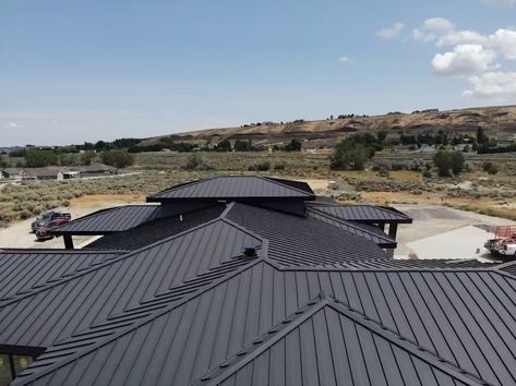 The Metal Roofing Alliance (MRA) has selected a remarkable new home construction project located in Kennewick, Wash., as the winner of its Best Residential Metal Roofing Project competition for the third quarter of 2022. The project, which C&C Roofing completed out of Hermiston, Oregon, features a beautiful mechanical seamed metal roof in a rich dark gray color! #metalroofing #metalroof #roofing #metalroofingspecialists #newroof #residentialroofing #homeowners #homeimprovement #roof Hermiston Oregon, Metal Shake Roof, Residential Metal Roofing, Roofing Styles, Metal Shingles, Homeowner Tips, Metal Roofs, Dark Tile, Standing Seam Metal Roof