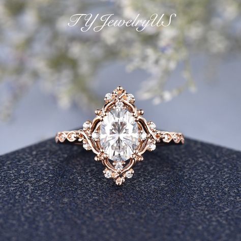 Art Deco Moissanite Engagement Ring Rose Gold Flower Shaped Diamond Halo Ring Vintage Cluster Vine Bridal Ring Woman Dainty Gift For Her Items Description: * Handmade, high-quality item! * Material: SOLID 14K/18K GOLD (can be made in white/rose/yellow gold) * Center stone: Moissanite Size: 6*8mm, Oval Cut, about 1.30 CT * Accents: Natural Diamonds, VS clarity, G color, 0.15ct Total Or Colorless Moissanites, DE color, VVS clarity * Band width approx 1.5mm Same design with different gemstone: Sapp Art Deco Engagement Ring Vintage, Moissanite Engagement Ring Rose Gold, Cute Engagement Rings, Rose Gold Flower, Future Engagement Rings, Engagement Ring Rose Gold, Diamond Halo Ring, Curved Wedding Band, Ring Ideas