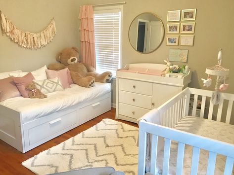 Simple and soft baby girl nursery. White, peach, natural wood and gold tones. Nursery Mirror. Daybed from ikea. Mirror from target. Frames from the dollar store. Nursery Room With Daybed, Target Frames, Nursery Mirror, Ikea Mirror Hack, Mirror Hack, Nursery Guest Room, Ikea Nursery, Baby Nursery Inspiration, Ikea Mirror