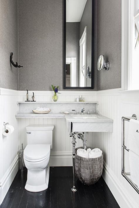 No space for a vanity? Consider adding a sink that runs parallel with the toilet and extends above it with attached, built-in shelving. Counter Over Toilet, Small Powder Rooms, Laundry Closet Makeover, Above Toilet, Toilet Decor, Bathroom Color Schemes, Bathroom Design Trends, Tiny Bathrooms, Over Toilet