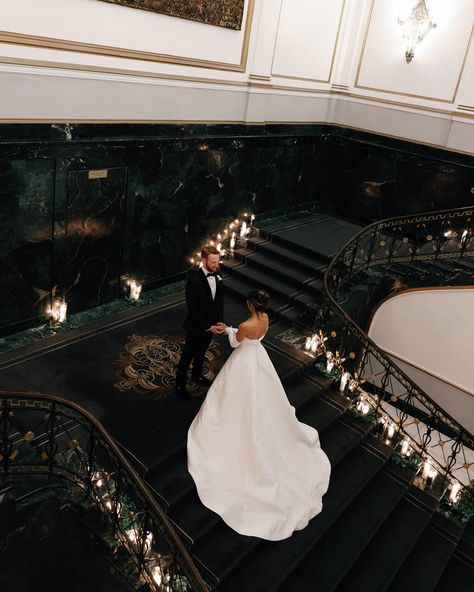 A Midnight Kiss at a Boston New Year’s Eve Wedding✨ Alie and Zach’s winter wedding theme of elegant, moody, classic glam was beautifully brought to life by @bameventsbos. The sophisticated color palette, enriched with gold accents and abundant candlelight, perfectly matched their vision. The photos by @cityluxstudios not only captured the couple’s happiness and the venue’s grandeur but also added a timeless elegance with black-and-white images that embodied the glam of their New Year’s Eve c... Classic Black White And Gold Wedding, Winter Wedding Black Tie, Old Money Wedding Color Palette, New Year’s Eve Wedding, Black White Gold Wedding Theme, White And Gold Wedding Themes, Winter Wedding Aesthetic, Sophisticated Color Palette, Winter Wedding Theme