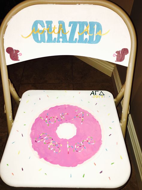 "Glazed with A's" is a study incentive for Alpha Gamma Delta. A seat in a pretty chair with a dozen donuts 🍩 #AGD #alphagammadelta #donuts #sorority Sorority Academic Chair Ideas, Whimsical Chairs, Donut Decor, Pajama Birthday Parties, Dozen Donuts, Pancakes And Pajamas, Donut Decorations, Alpha Xi Delta, Chair Ideas