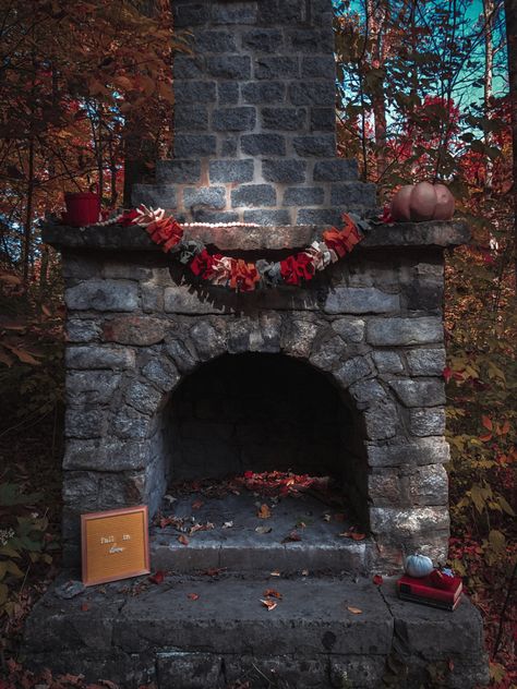 This photo has deep fall colors, a chimney and books, a few scattered pumpkins, and a garland dressing up the abandoned fireplace in the woods. Chimney Aesthetic, Feminine Era, Fall Decoration, Dark Feminine, Fall Decor, Fireplace, Home Decor, Home Décor