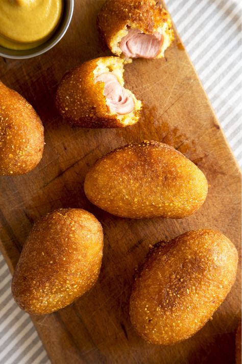 20 mins. · Makes 16 pcs. · Remake those iconic carnival corn dogs at home with our easy-to-follow recipe! It’s made with just a few ingredients, and ready in 20 minutes. Learn how to make Homemade Mini Corn Dogs with this recipe. #Recipes #Food #Crave #Tasty #Yummy #Delicious #FoodTrip #FoodLover #Recipes.net #foodporn #Cook #Cooking #Foodie #foodblog #homemade #CornDogs #MiniCornDogs #AppetizerRecipes Homemade Mini Corn Dogs, Corn Dogs Recipe, Homemade Corndogs, Dogs At Home, Mini Corn Dogs, Corndog Recipe, Corn Dogs, Snacks Recipes, How To Make Homemade