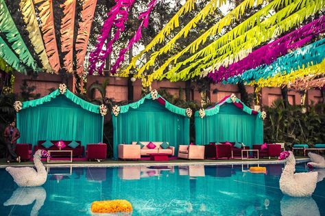 10 Amazing Sangeet Themes To Try For Your Wedding! | WedMeGood Sangeet Theme Ideas, Sangeet Theme, Wedding Pool Party Decorations, Pool Wedding Decorations, Mehendi Decor Ideas, Wedding Pool Party, Themed Wedding Decorations, Pool Party Themes, Pool Wedding