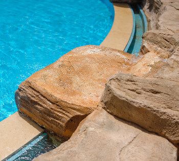 Bored with boards? Then consider a diving rock for your inground swimming pool. Here's an overview of this fun and naturalistic pool feature. Pool With Diving Board, Luxury Pools Indoor, Pool Landscaping Ideas, Pool Landscape Ideas, Inground Pool Landscaping, Pool Remodel, Pool Landscape Design, Diving Board, Swimming Pools Inground