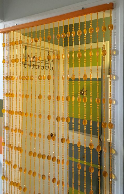 Vintage MCM Door Beads in Orange.  Available at facebook.com/madpadder. Mid Century Modern Bedroom Curtain Ideas, 70s Beads Curtain, 70s Door Beads, Vintage Beaded Curtain, Door Beads Aesthetic, Vintage Mcm Bedroom, 70s Beaded Curtain, 70s Door Decoration, 60s Decorations Party