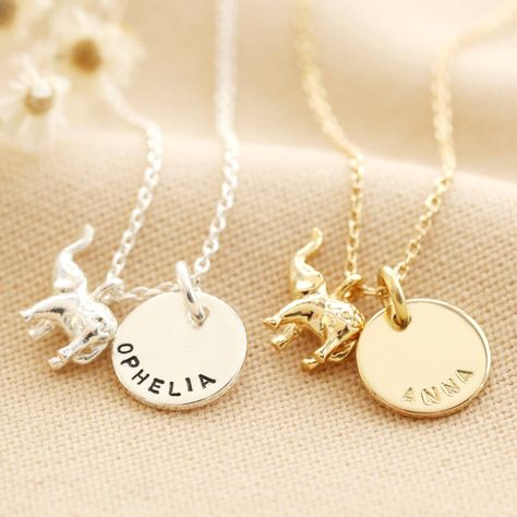 A super sweet necklace for animal lovers, complete with a personalised touch. Available in silver or gold plated brass, this necklace features a cute elephant pendant with a mandala design on its back, alongside a disc shaped charm which will be personalised by our in-house team with wording of your choice and suspended from a trace chain. Makes a wonderful personal gift for her! Personalisation Information The disc charm can be hand-stamped with up to 17 characters. Choose your hand-stamping fi Elephant Charm Necklace, Elephant Pendant Necklace, Tiny Elephant, Sweet Necklace, Elephant Necklace, Charm Necklace Silver, Leather Keyring, Elephant Pendant, Elephant Charm