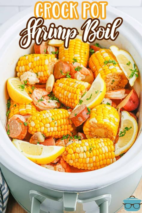 A white container of Shrimp Boil ready to serve. Crockpot Crawfish Boil, Slow Boil Seafood, Shrimp Boil In Crock Pot, Crockpot Crab Boil, Crock Pot Shrimp Boil, Crockpot Seafood Boil, Crockpot Shrimp Boil, Crockpot Shrimp Recipes, Shrimp Slow Cooker