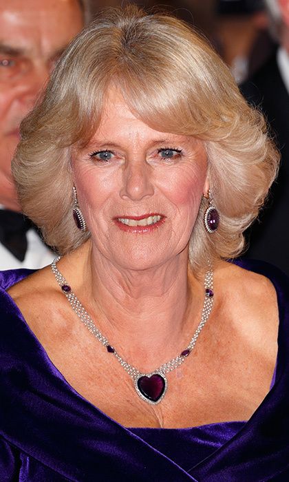 Heart-shaped quartz necklace  At the premiere of Skyfall at London's Royal Albert Hall in October 2012, Camilla wore a necklace reminiscent of a gem from another movie – the romantic blue heart-shaped diamond from Titanic. The Duchess' colorful stone, however, is purple quartz and was a wedding gift for Queen Elizabeth, the Queen Mother on the occasion of her 1923 wedding. Prince Charles Wife, Diamond Headpiece, Royal Films, Royal Diamond, Rainha Elizabeth Ii, Camilla Duchess Of Cornwall, Queen Alexandra, Prince Charles And Camilla, Camilla Parker Bowles