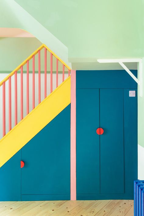 18 Smart and Surprising Under-Stair Storage Solutions - Dwell Blue Painted Door, Under Stairs Storage Solutions, Under Stair, Mini Loft, Recycled Brick, Painted Cupboards, Victorian Townhouse, Painted Walls, Wooden Stairs