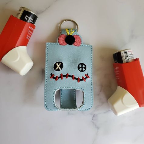 Keep your essentials close to you and convenient to use. This inhaler case clips on to backpacks, purses, diaper bags and any other items with a zipper. This case comes with 2 different size openings for your mouthpiece. The red and white inhaler shown in the photos needs the larger opening. Measurements are listed below so you can measure and make sure you get the correct size. Measurements are approximate and may vary slightly. Size with inhaler in it: 3.75 in tall 2.25 inches in middle fits a Asthma Inhaler Holder, Inhaler Keychain, Inhaler Holder, Inhaler Case, Asthma Inhaler, Personalized Gifts For Kids, Birthday Gift For Him, Diaper Bags, Bits And Bobs