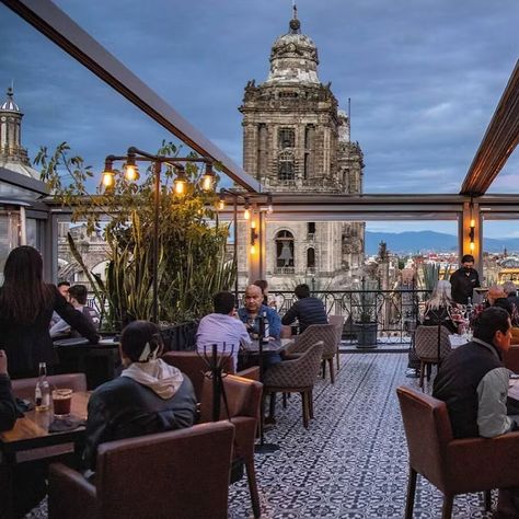 Zocalo Central Rooftop Hotel Mexico City. Historic elegance with rooftop dining views Overlooking the historic Metropolitan Cathedral, this elegant property offers spacious rooms and a rooftop restaurant with breathtaking views of the Plaza. Enjoy complimentary 24-hour snacks, free-flow bottled water, and a delightful breakfast with a view of the main square. https://expedia.com/affiliates/vacayexpert/mexicocity #mexico #mexciocity #travel #weekendgetaway #vacation #trip #trips Mexico City Restaurants, Breakfast With A View, Rooftop Dining, Mexico Trip, Rooftop Restaurant, Bottled Water, City Hotel, The Plaza, Mexico Travel