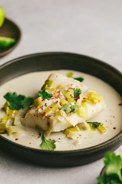 Poached Cod in Coconut Milk (Keto, Low Carb) - Stem and Spoon Cod In Coconut Milk, Fish And Coconut Milk Recipes, Coconut Poached Cod, Baked Cod With Coconut Milk And Lemon, Coconut Poached Fish, Cod Coconut Milk, Coconut Milk Poached Cod, Poached Cod In Coconut Milk, Asian Cod Fish Recipes