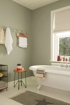 Pale, muted greens make for a serene bathroom space. Try Overtly Olive on bathroom walls with splashes of bright red or coral to add a twist. Eyebrow Makeup Tips Green Bathroom Ideas Sage, Overtly Olive, Green Bathroom Colors, Light Green Bathrooms, Olive Bedroom, Painting Bathroom Walls, Green Bathroom Rugs, Light Green Walls, Green Painted Walls