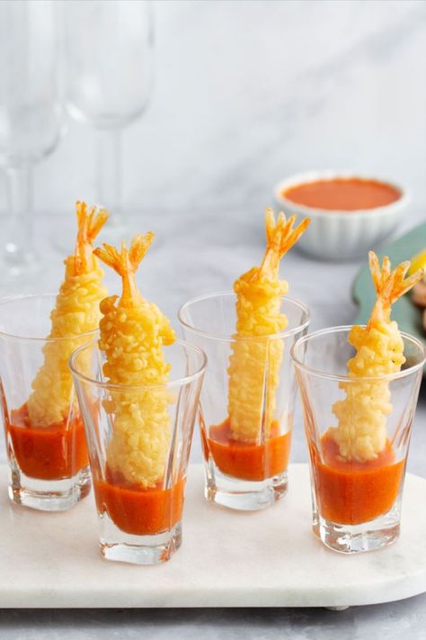 Tempura Shrimp with Romesco Dipping Sauce recipe. Crispy and delicious Tempura Shrimp served with a puree of roasted red peppers, almonds and garlic. This nutty Spanish sauce is rich, tangy, smoky, creamy, and sweet, and a great way to liven up your next gathering. Fancy Party Food, Spanish Sauce, Sushi Buffet, Tempura Shrimp, Tempura Prawns, Wedding Food Display, Cocktail Hour Food, Tempura Recipe, Canapes Recipes