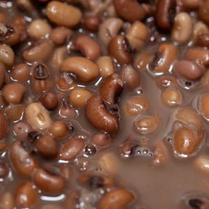 Refried Sea Island Red Peas - Southern Pea and Bean Recipes | Anson Mills - Artisan Mill Goods Red Peas, Refried Bean, Rice And Peas, Cotija Cheese, Red Rice, Pickling Jalapenos, Sea Island, Bean Casserole, Lime Wedge