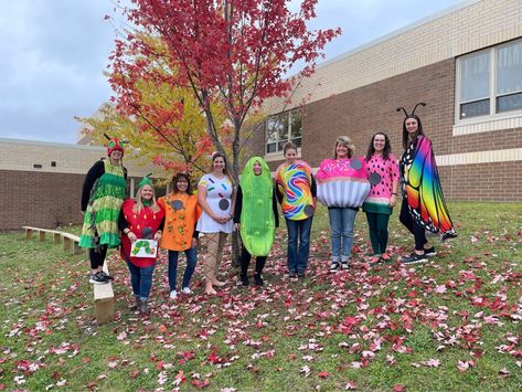 Very Hungry Caterpillar Halloween Costume Family, Group Bookweek Costume, Hungry Caterpillar Group Costume, Hungry Caterpillar Family Costume, Very Hungry Caterpillar Costume Teacher, Group Book Week Costume Ideas, Hungry Caterpillar Costume Teacher, Group Book Week Costumes, Very Hungry Caterpillar Halloween