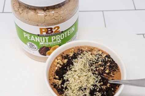 Oreo Crunch Smoothie Bowl  With a simple base of almond milk,  a frozen banana, and two scoops of PB2 Performance Peanut Protein, this is a smoothie bowl that packs a punch while remaining guilt-free. PB2 Protein gives the bowl a whopping 20 grams of complete plant-based protein, Chocolate Peanut Butter Chia Pudding, Peanut Butter Chia Pudding, Workout Recipes, Peanut Butter Powder Recipes, Oreo Crunch, Pb2 Recipes, Energy Smoothie Recipes, Energy Smoothies, Funky Monkey