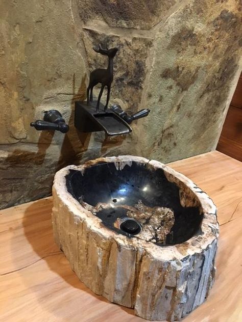 Availability: In Stock Description Petrified Wood Sink The sink was at one point natural wood, now stone created by nature over thousands of years. The process called fossilization replaces all the organic materials in the wood with minerals keeping the structure of the wood but effectively turning it into stone. Photo shown is only for example. You must choose from photos of available sinks here We recommend the D001 drain as it is specifically for thicker sinks. The sink will need to be sealed Log Furniture Bathroom, Tree Trunk Sink Pedestal, Sink Bowl On Top Of Vanity Rustic, Natural Wood Vanity Bowl Sink, Powder Room Wood Live Edge Countertop, Sink On Rustic Shelf, Pebble Sink Bathroom, Antique Dough Bowl Sink, Dough Bowl Bathroom Sink