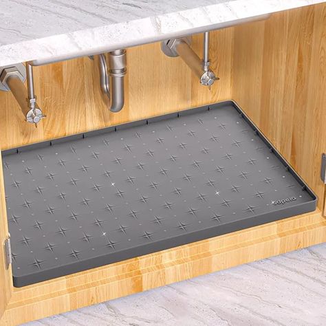 The Sdpeia Under Sink Mat Is 31% Off on Amazon! | The Kitchn Kitchen Sink Mat, Under Sink Mat, Kitchen Cabinet Liners, Cabinet Liner, Sink Tray, Under Sink Cabinet, Under Sink Organization, Sink Mats, Environmental Sustainability