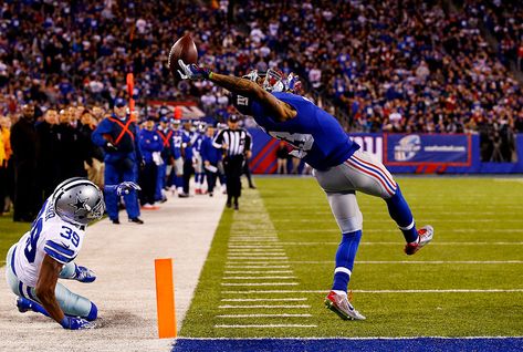 EAST RUTHERFORD, NJ - NOVEMBER 23:  Odell Beckham #13 of the New York Giants scores a touchdown in the second quarter against the Dallas Cowboys at MetLife Stadium on November 23, 2014 in East Rutherford, New Jersey.  (Photo by Al Bello/Getty Images) Jerry Jones, Madden Nfl, Odell Beckham, Giants Football, Browns Fans, Odell Beckham Jr, Coloring Pages For Boys, Beckham Jr, Ny Giants