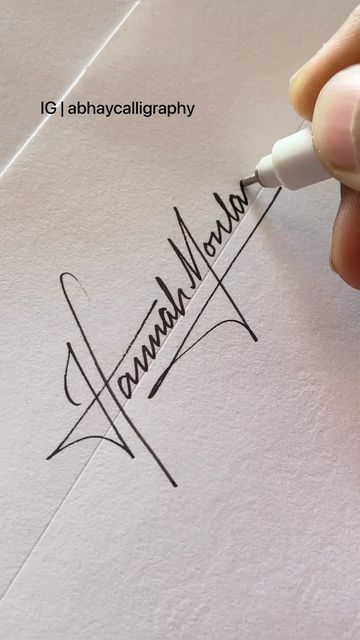 Abhay Pratap Singh Rathore on Instagram: "Want Name Design for yourself? DM ‘Signature’ This one is for Hannah Montana And its NOT FREE Pen - @marvyuchida_india Fineliner Pen 0.5 on a Bond Paper . #signature #handwriting #signaturedesign #calligraphy #lettering #handmade #trendingreels #reels #trendy #reelsinstagram #reelsvideo #ballpen #uniball #artistsoninstagram #signatureday #ethanhunt #missionimpossible #tomcruise #fontdesign #font #graphicsdesign #design #handwritten #celebritystyle #cel Hannah Signature Ideas, H Letter Signature Ideas, Hannah In Cursive, Aesthetic Signature Ideas For Letter J, T Signature Ideas, Hannah Calligraphy, H Signature Ideas, Hannah Lettering, Signature Letters