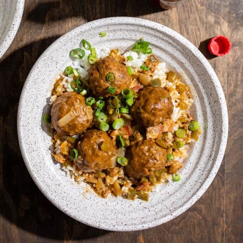 Cajun Meatball Fricassee | Cook's Country Meatball Fricassee, Cajun Meatball Stew Recipe, Cajun Gravy, Cajun Meatballs, South Louisiana Recipes, Meatballs In The Oven, Rice For Dinner, Meatball Stew, Donut Toppings