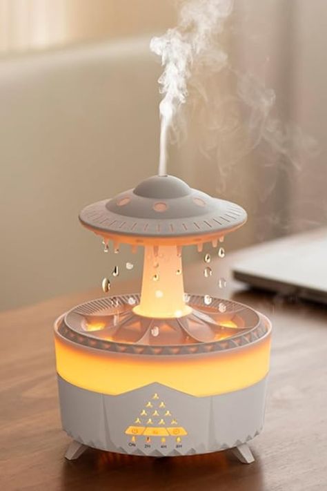 Experience soothing warmth and mist with our Rain Cloud Humidifier. Perfect for small to medium rooms, bedrooms, and more. Enjoy 7 changing colors for a relaxing ambiance. Available in white Cloud Humidifier, Baby Humidifier, Mist Humidifier, Water Drip, Rain Cloud, Projector Lamp, Rain Clouds, Media Room, Lamp Decor