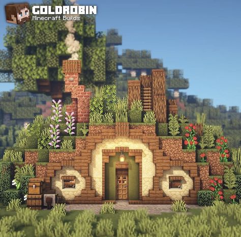 @xgoldrobin on instagram Small Hobbit House Minecraft, Hole In The Wall Minecraft House, Minecraft Greenhouse Blueprints, Fishing Town Minecraft, Minecraft Smithy, Minecraft Hobbit Hole Entrance, Hobbit Home Minecraft, Bee Dome Minecraft, Goldrobin Minecraft