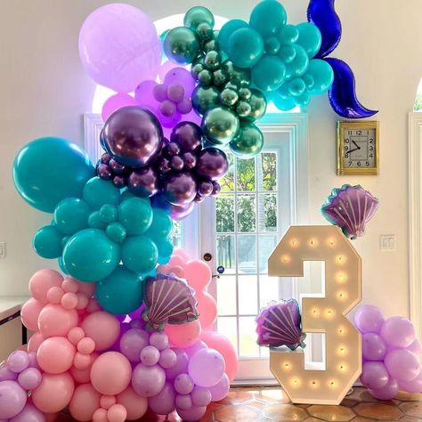 PRICES MAY VARY. 【Mermaid Balloon Garland Arch Kit】Macaron Purple Balloon(18In 1PCS + 10In 20PCS + 5In 10PCS); Pink Balloon(18In 1PCS + 10In 25PCS + 5In 10PCS); Lake Blue Balloon(18In 1PCS + 10In 25PCS + 5In 10PCS);Metallic Purple Balloon(18In 1PCS+10In 20PCS + 5In 5PCS); Metallic Green Balloon(10In 15PCS+5In 10PCS); Purple Mermaid Sheel-3PCS;18In Mermaid Tail Foil Balloon 2PCS; Accessories(Dot Glue 1PCS + Balloon Strip 1PCS). 【Non-toxic and safe】Our mermaid balloon arch kit, non-toxic and very Mermaid Balloon Arch, Under The Sea Party Decorations, Sea Party Decorations, Mermaid Birthday Party Food, Princess Birthday Decorations, Birthday Under The Sea, Ariel Birthday Party, Mermaid Balloons, Balloon Arch Kit