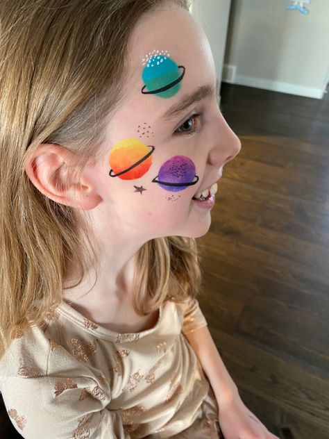 Space Themed Face Painting, Face Paint Ideas For Kids Easy, Planet Face Paint, Face Painting Ideas For Adults For Women, Astronaut Face Paint, Space Theme Face Paint, Children’s Face Paint, Kawaii Face Paint, Space Face Painting