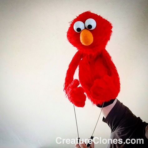 The Creature Clones Elmo puppet rendition! #Elmo #puppet #muppet #custompuppets #professionalpuppets #filmpuppets #tvpuppets Elmo Puppet, Professional Puppets, Custom Puppets, The Muppet Show, Sesame Street, On Set, Puppets