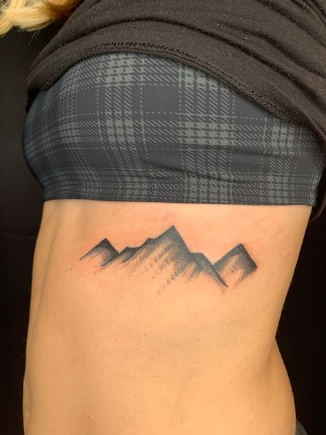 mountain range black rib tattoo Whale Tattoo, Great Whale, Whale Tattoos, Rib Tattoo, Mountain Range, Leaf Tattoos, Maple Leaf Tattoo, Triangle Tattoo, Range