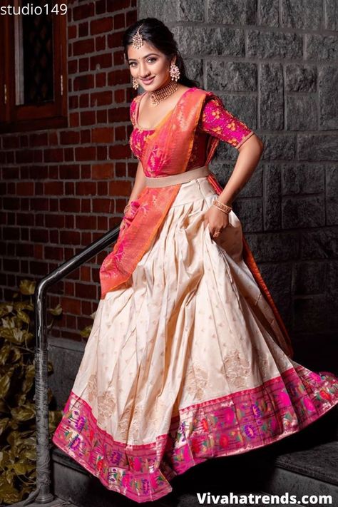 The beautiful half saree/Lehenga came with a Embellished blouse paired in hot pink and a peach Banarasi dupatta and Paithani silk skirt by studio149- Vivaha Trends Paithani Lehenga Blouse Designs, Paithani Lehenga Half Saree, Paithani Langa Voni, Paithani Half Saree Designs, Paithani Half Saree, Half Saree Draping, Latest Half Saree Designs, Dhavani Designs, Langa Voni Half Saree