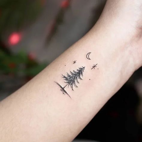 Pine Tree Wrist Tattoos For Women, Christmas Tree Tattoo Small Simple, Fur Tree Tattoo, Dainty Christmas Tattoos, Pine Tree Tattoo Minimalist, Evergreen Tattoos For Women, Two Pine Tree Tattoo, Pine Tree Moon Tattoo, Small Forest Tattoos For Women