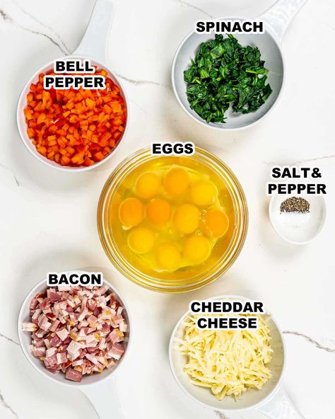 Start your day right with these incredibly easy Egg Muffins, made with bacon, bell peppers, spinach and lots of cheese. They're great for make-ahead and are super versatile plus they can be made with any ingredients. They’re the perfect grab-and-go meal. #eggmuffins #breakfast Spinach And Bell Pepper Egg Bites, Egg Muffins Breakfast Healthy Protein, Egg Muffins Breakfast Healthy, Easy Egg Muffins, Bacon Egg Muffins, Bacon Muffins, Spinach Muffins, Egg Bites Recipe, Egg Muffins Breakfast