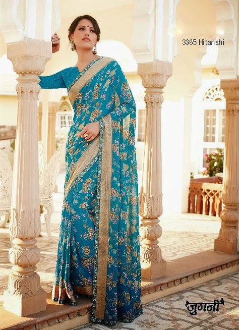 We are a renowned manufacturer and supplier of a unique range of Printed Saree. This stylish saree is designed and fabricated by our adroit professionals utilizing supreme quality soft fabrics that are procured from the reliable vendors of the market. Laxmipati Sarees, Chikan Embroidery, Embroidery Work Blouse, Floral Saree, Designer Sarees Collection, Teal Blue Color, Casual Saree, Gowns For Girls, Stylish Sarees