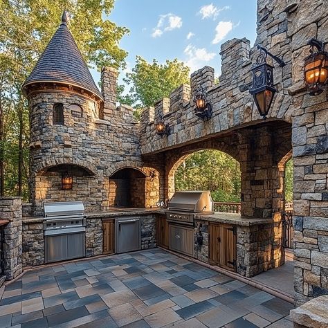 This castle-inspired outdoor kitchen merges medieval charm with modern functionality, creating a majestic space for outdoor cooking and entertaining. Featuring stone-clad walls, arched doorways, and wrought-iron accents, the design evokes the grandeur of an ancient fortress. A central stone hearth serves as the focal point, perfect for open-fire cooking, while Gothic-style lighting and a turreted pizza oven add to the old-world ambiance. Ideal for hosting grand feasts, this kitchen offers a u... House Yard Design, Ancient Fortress, Castle Kitchen, Medieval Kitchen, Tiny Castle, Castle Kitchens, Castle Architecture, Stone Hearth, Arched Doorways